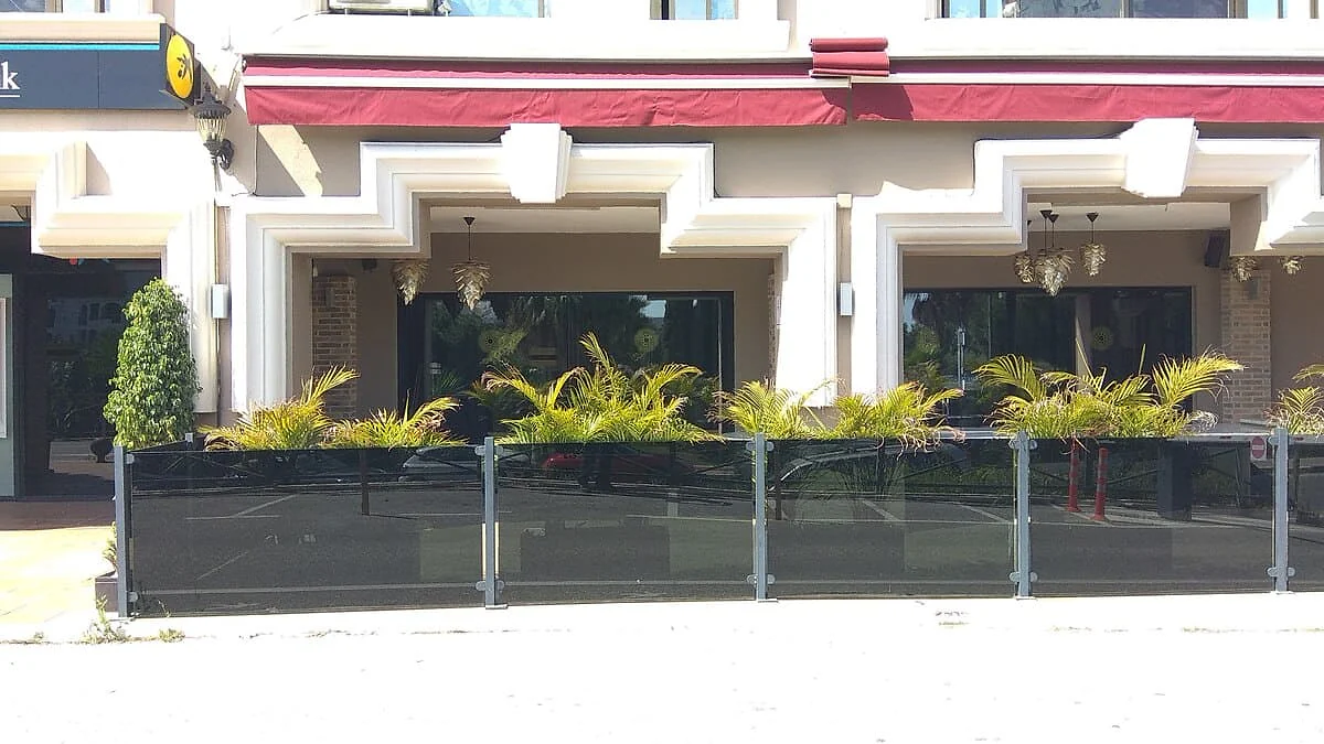 Black privacy window film on a restaurant frontage in Marbella