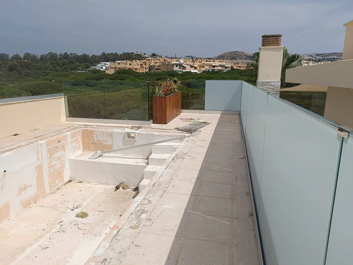 White frosted privacy film on rooftop pool glass balustrade panels