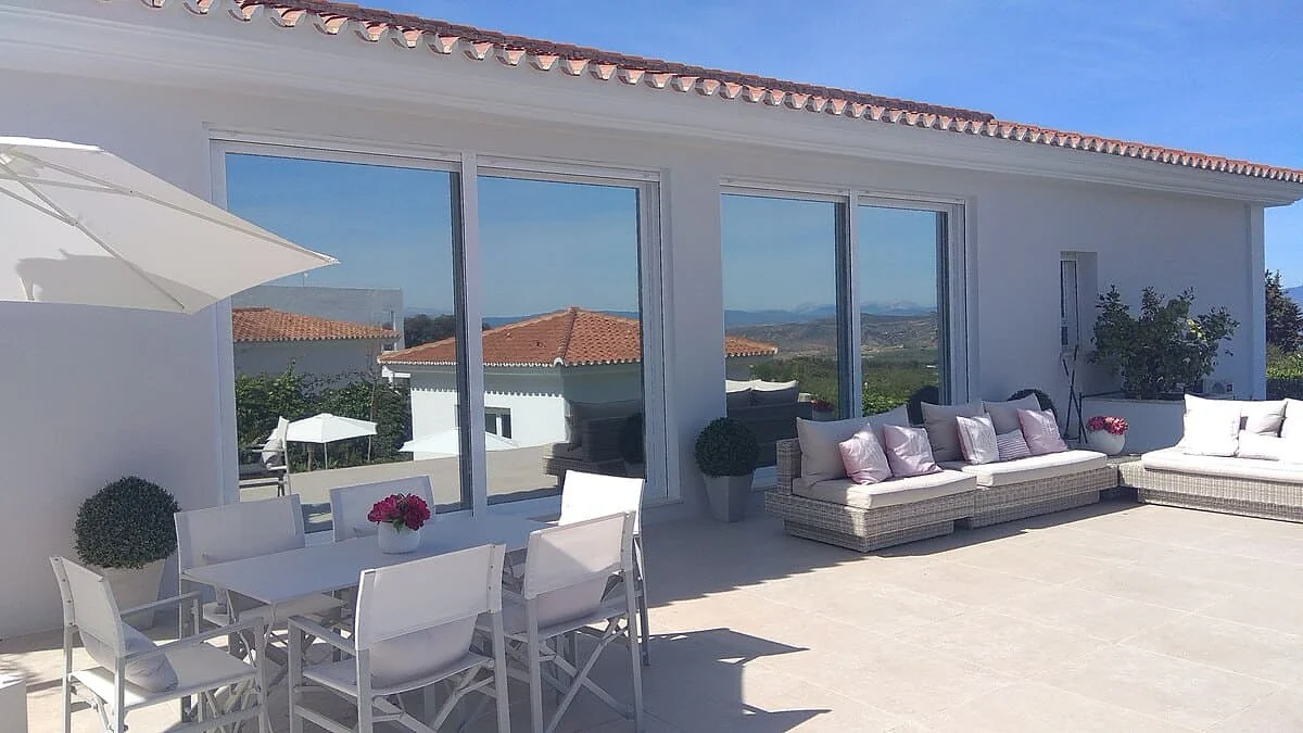 Heat reduction window film on villa terrace sliding doors in Marbella