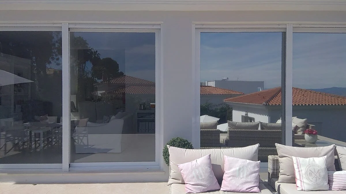 Solar window film on home terrace sliding doors in Marbella