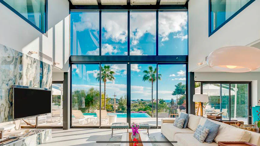 A Marbella villa lounge with plain, untreated glass