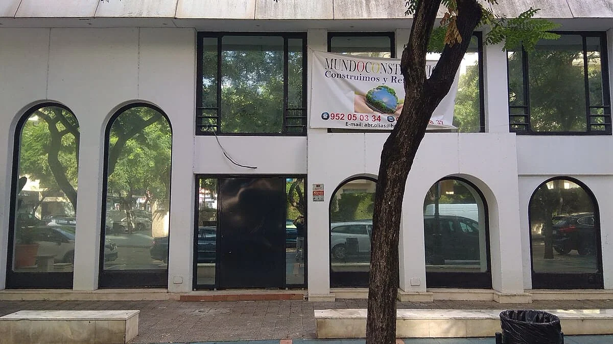 Window film on arched glazing of a mixed-use building on the Costa del Sol